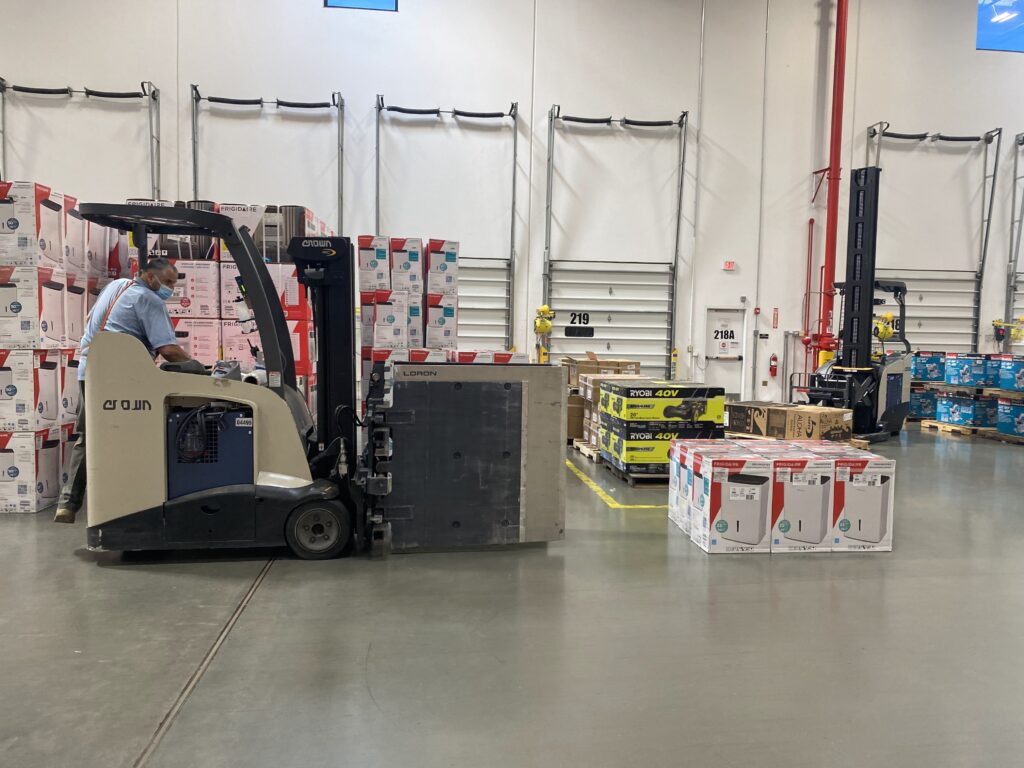 Hydrogen fuel cell forklift moving merchandise in a Home Depot location. 